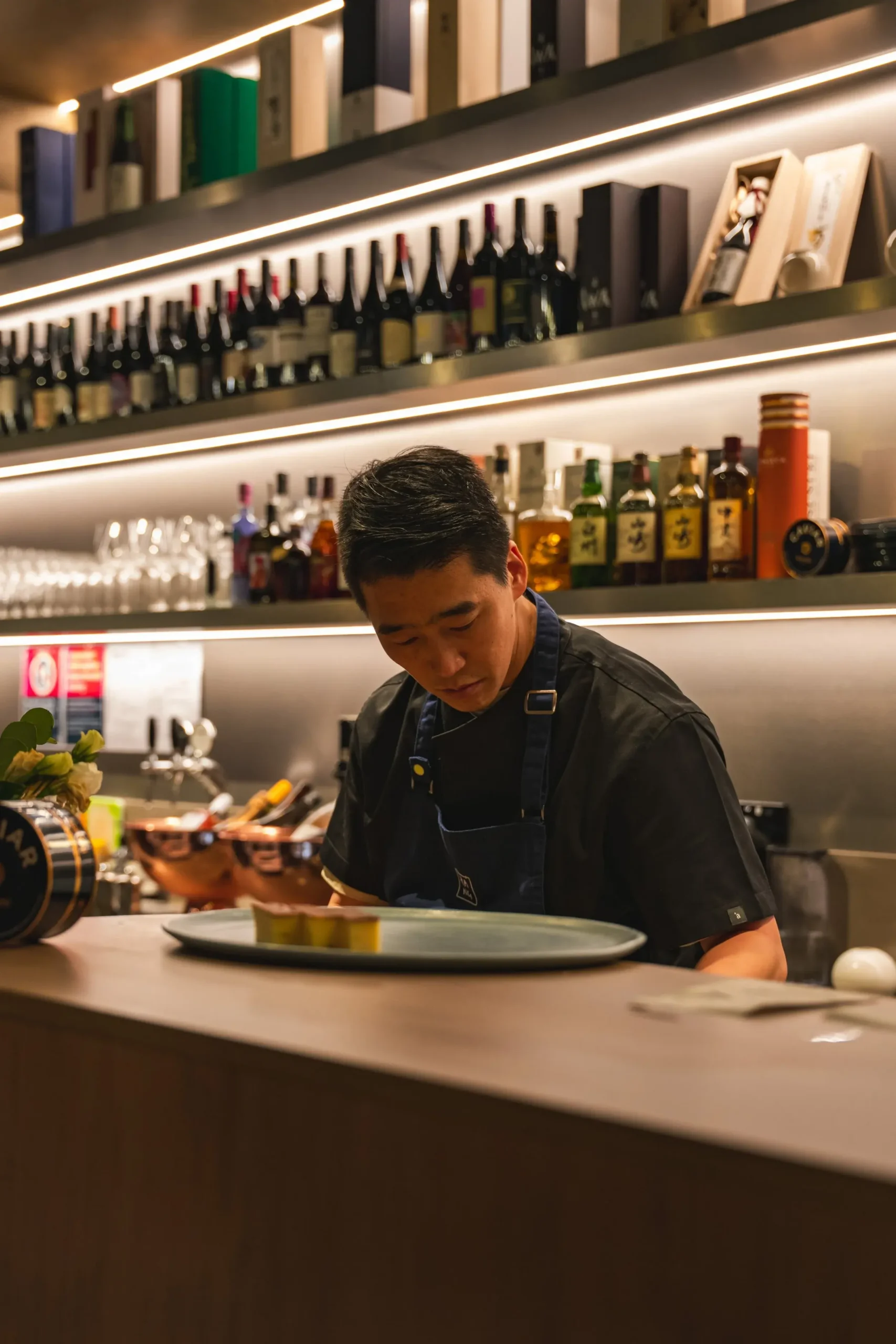 Japanese sashimi chef prepares Opal Barramundi